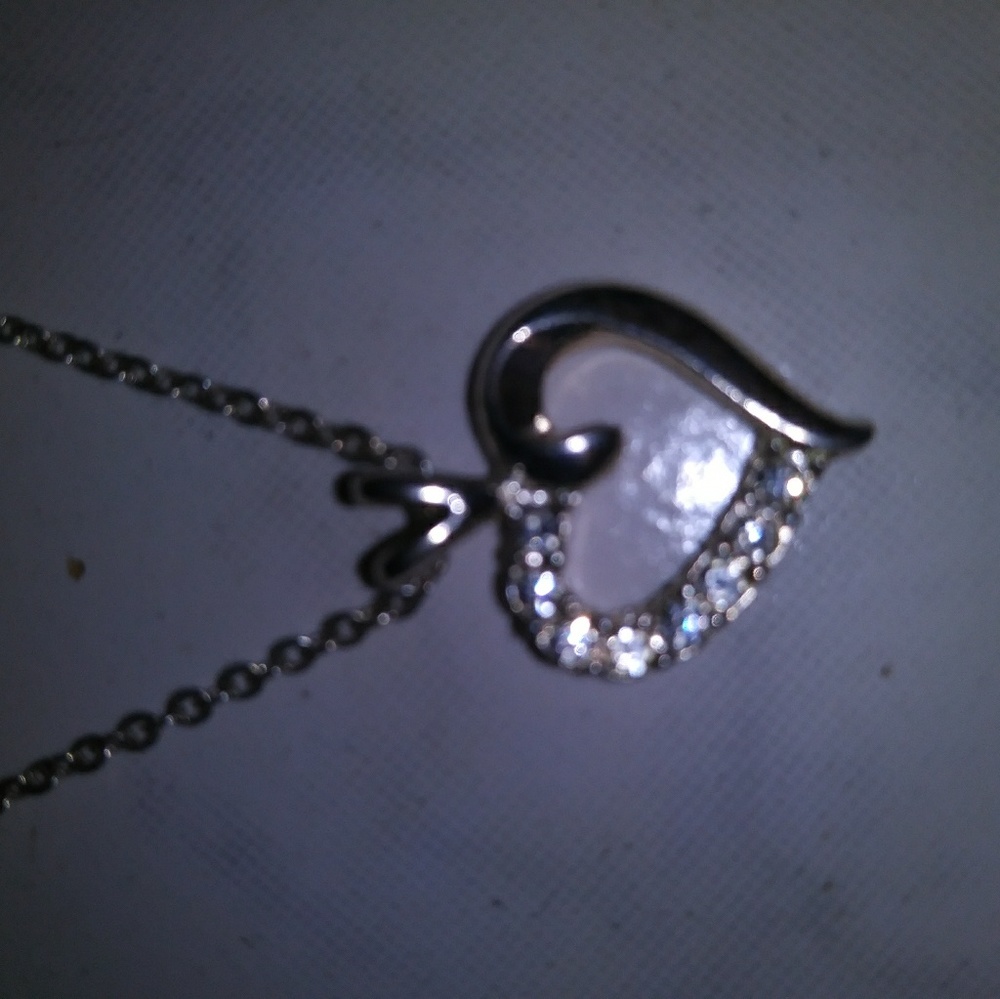 Vintage silvertone necklace heart half has clear rhinestones made well bail good
